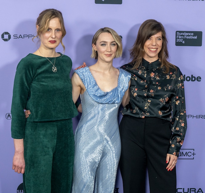 (Rick Egan | The Salt Lake Tribune)    Writer Amy Liptrot, Saoirse Ronan, and director Nora Fingscheidt, on the Press line for "The Outrun" at the Library Center in Park city, during the Sundance film Festival, on Friday, Jan. 19, 2024.
