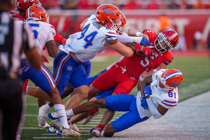 (Trent Nelson  |  The Salt Lake Tribune) Utah Utes wide receiver Mycah Pittman (5) is pushed out of bounds as the Utah Utes host the Florida Gators, NCAA football in Salt Lake City on Thursday, Aug. 31, 2023.