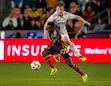 (Bethany Baker  |  The Salt Lake Tribune) Real Salt Lake midfielder Anderson Julio (29) and St. Louis City midfielder Chris Durkin (8) fight for the ball as RSL hosts the St. Louis City during an MLS soccer match in Sandy on Saturday, March 30, 2024.