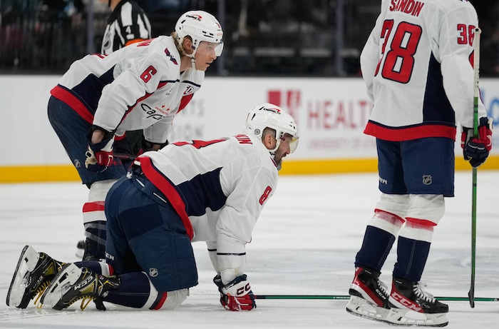 (Francisco Kjolseth  | The Salt Lake Tribune) Washington Capitals left wing Alex Ovechkin (8) is injured while playing the Utah Hockey Club during an NHL hockey game at the Delta Center in Salt Lake City on Monday, Nov. 18, 2024.