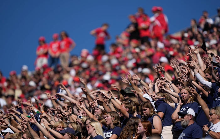 (Francisco Kjolseth  | The Salt Lake Tribune) Aggies fans cheer on their team as Utah State hosts the University of Utah during the first half of an NCAA college football game Saturday, Sept. 14, 2024, in Logan, Utah.