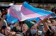 (Francisco Kjolseth | The Salt Lake Tribune) West High School students chant “trans youth are valid” as they wave a transgender flag during a walkout on Wednesday, April 6, 2022 to protest banning transgender girls from participating in female school sports. Utah currently has a commission that determines which transgender girls can or can't compete in high school athletics; on Jan. 6, 2024, the commission approved a set of standards on which to make those decisions, including testosterone levels.