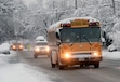 (Al Hartmann  |  The Salt Lake Tribune) School bus in Sugarhouse runs on time Tuesday morning Dec. 15 as the city digs out from yesterday's record breaking snowfall.