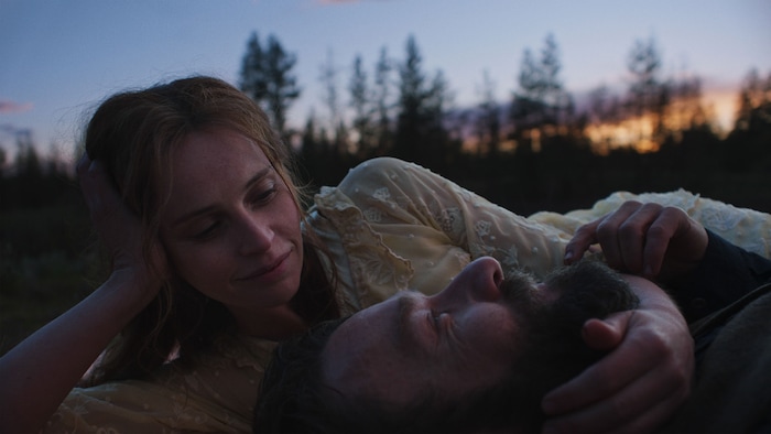 (Adolpho Veloso  |  Sundance Institute) Joel Edgerton, bottom, and Felicity Jones star in director Clint Bentley's "Train Dreams," an official selection of the 2025 Sundance Film Festival, in the Premieres program.