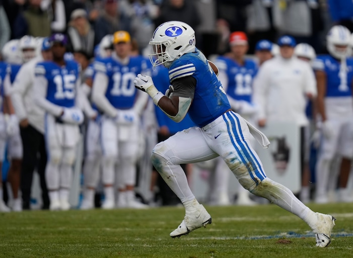 (Bethany Baker  |  The Salt Lake Tribune) Brigham Young Cougars running back Aidan Robbins (3) runs the ball against the Oklahoma Sooners at LaVell Edwards Stadium in Provo on Saturday, Nov. 18, 2023.