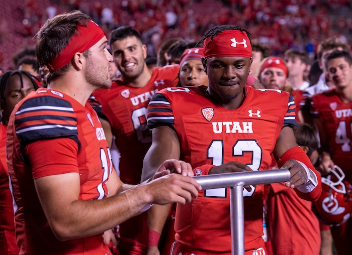 (Rick Egan | The Salt Lake Tribune) 
Utah Utes quarterback Bryson Barnes (16) and  quarterback Nate Johnson (13), prepare to light the U, after the Utes defeated the Florida Gators. At Rice-Eccles Stadium, on Thursday, Aug. 31, 2023.
