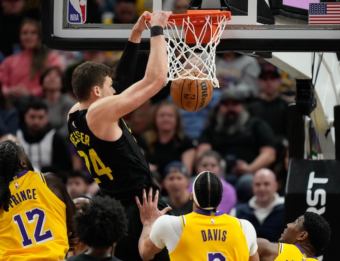 (Francisco Kjolseth  |  The Salt Lake Tribune) Utah Jazz center Walker Kessler (24) makes a dunk over the Lakers during an NBA basketball game Wednesday, Feb. 14, 2024, in Salt Lake City.