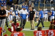 (Chris Samuels | The Salt Lake Tribune) Brigham Young Cougars head coach Kalani Sitake, left, chats with Utah Utes head coach Kyle Whittingham during pregame warmups, Saturday, Sept. 11, 2021 in Provo.