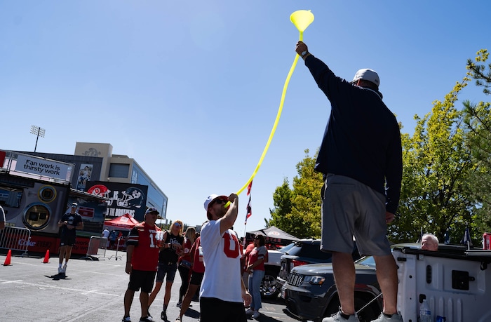 (Francisco Kjolseth  | The Salt Lake Tribune) Utah and Utah State fans tailgate before the game as Utah State hosts the University of Utah for an NCAA college football game Saturday, Sept. 14, 2024, in Logan, Utah.