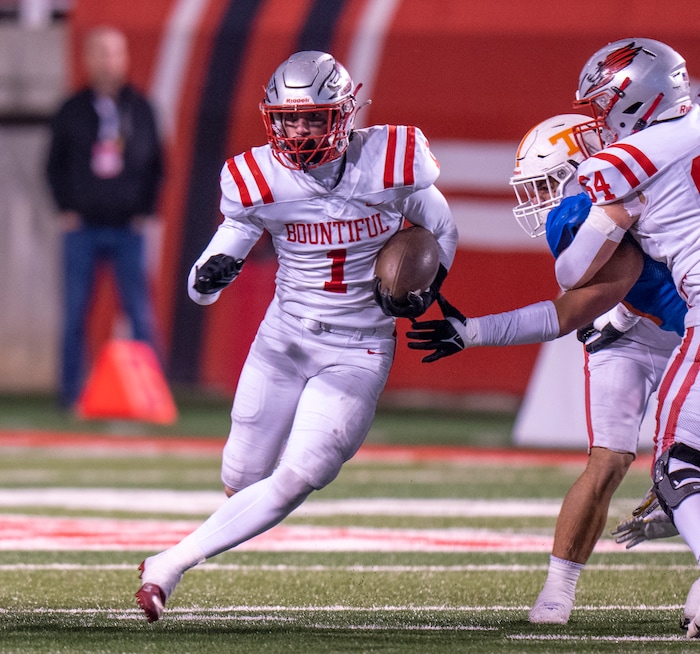 (Rick Egan | The Salt Lake Tribune)   Brigham Morrison runs for the Redhawks, in 5A State playoff action between the Timpview Thunderbirds and the Bountiful Redhawks, at Rice-Eccles Stadium, on Friday, Nov. 17, 2023.
