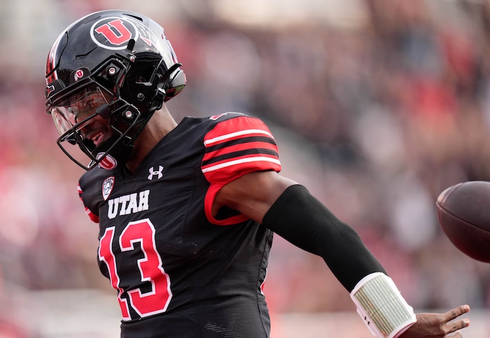 (Francisco Kjolseth  |  The Salt Lake Tribune) Utah Utes quarterback Nate Johnson (13) celebrates his 59-yard run touchdown as the Utah Utes host the Arizona State Sun Devils in NCAA football in Salt Lake City on Saturday, Nov. 4, 2023.