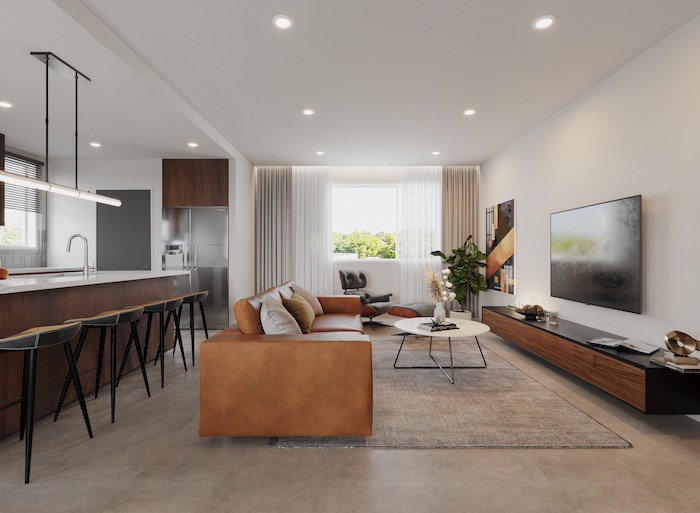 (CW Land Co.) A rendering of one of the interiors — a large living room — in the apartments in theYARD, C.W. Urban's 8.58-acre build-to-rent development in Salt Lake City's Fairpark neighborhood.