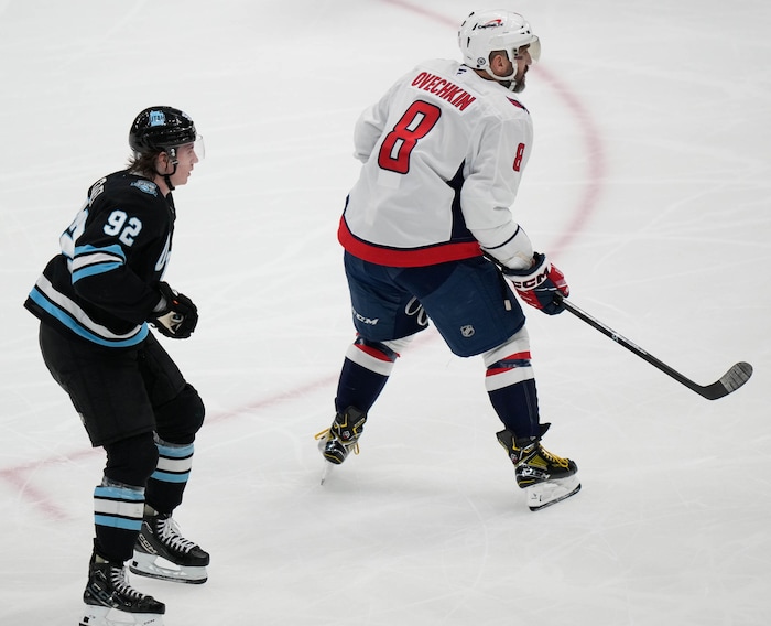 (Francisco Kjolseth  | The Salt Lake Tribune) Utah Hockey Club center Logan Cooley (92) skates alongside Washington Capitals left wing Alex Ovechkin (8) during an NHL hockey game at the Delta Center in Salt Lake City on Monday, Nov. 18, 2024.