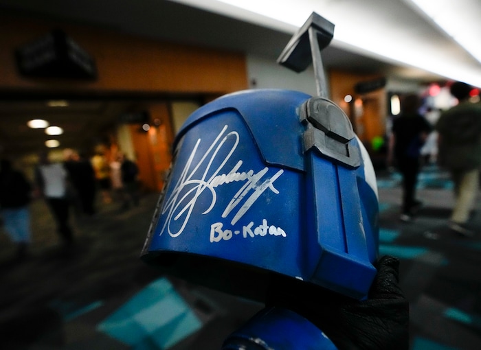 (Bethany Baker | Salt Lake Tribune) Vanessa Sewell holds her autographed Bo-Katan helmet after meeting actress Katee Sackhoff who plays the character in The Mandalorian television series during FanX at Salt Palace Convention Center in Salt Lake City on Friday, Sept. 22, 2023.