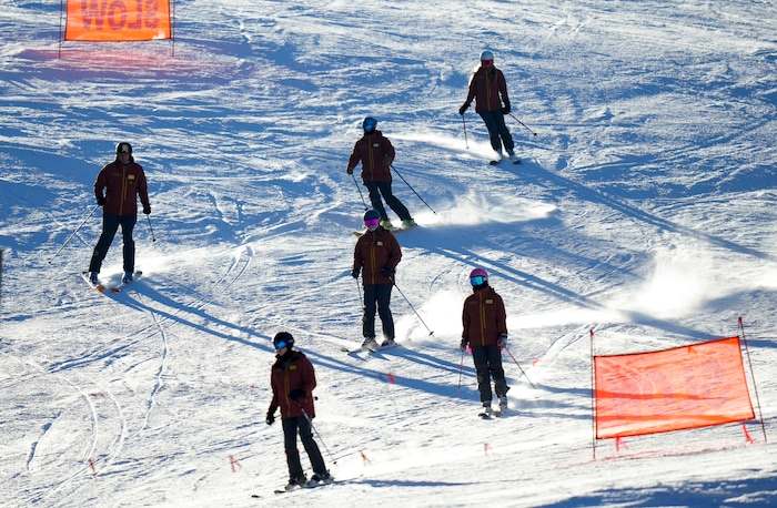 (Bethany Baker  |  The Salt Lake Tribune) A group of Sundance Resort staff ski down the run at Sundance Resort near Provo on Thursday, Dec. 14, 2023.