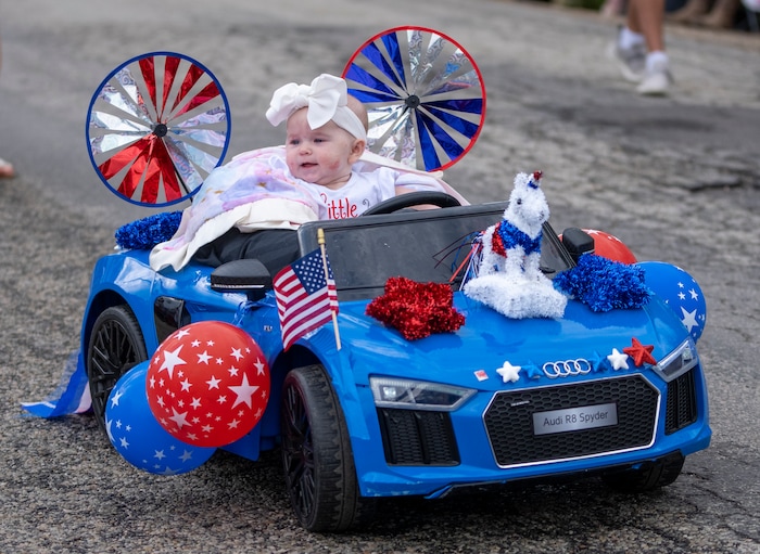 (Rick Egan | The Salt Lake Tribune) Saisha Nesbit appears to be driving a car in the parade, during the Liberty Days Celebration in Liberty, Utah, on Tuesday, July 4, 2023.  