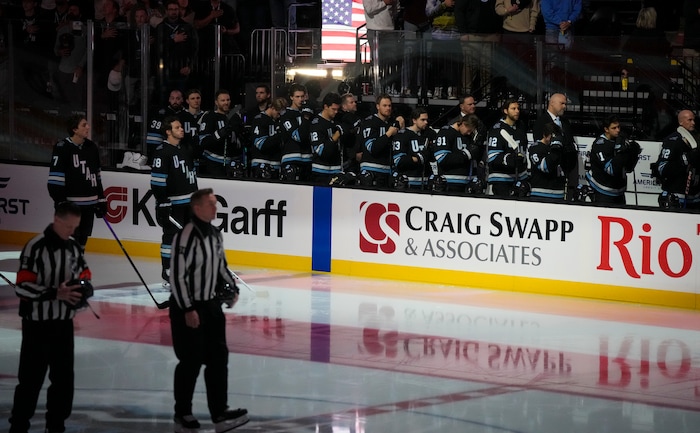 (Bethany Baker  |  The Salt Lake Tribune) Utah Hockey Club stands during the National Anthem before the game between the Utah Hockey Club and the Colorado Avalanche at the Delta Center in Salt Lake City on Thursday, Oct. 24, 2024.