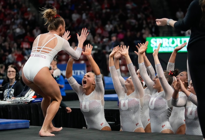 (Francisco Kjolseth  |  The Salt Lake Tribune) Abby Paulson celebrates her floor routine with teammates during the Pac-12 Gymnastics Championships, at the Maverik Center in West Valley City on Saturday, March 23, 2024.