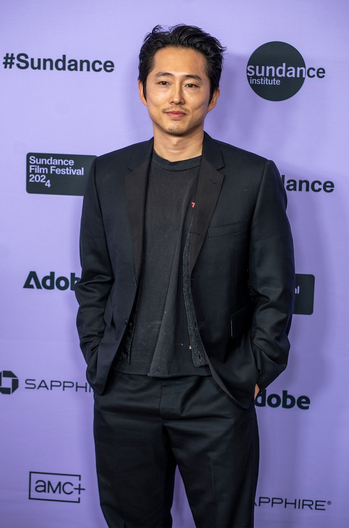 (Rick Egan | The Salt Lake Tribune)  Steven Yeun, on the press line for the premiere of "Love Me" at the Eccles Theatre at the Sundance Film Festival, on Friday, Jan. 19, 2024.
