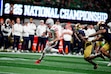 Ohio State quarterback Will Howard runs against Notre Dame during second half of the College Football Playoff national championship game Monday, Jan. 20, 2025, in Atlanta. (AP Photo/Jacob Kupferman)