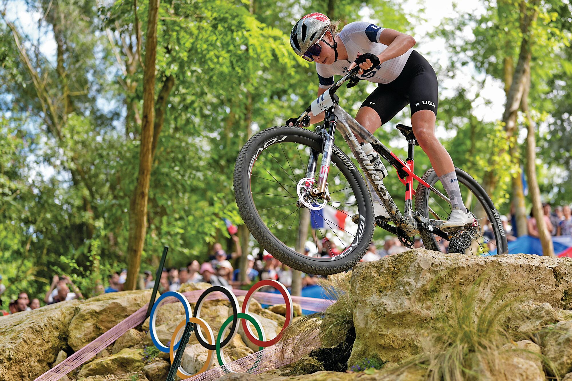 Haley Batten, of United States, competes in the women's mountain bike cycling event, at the 2024 Summer Olympics, Sunday, July 28, 2024, in Elancourt, France. (AP Photo/George Walker IV)