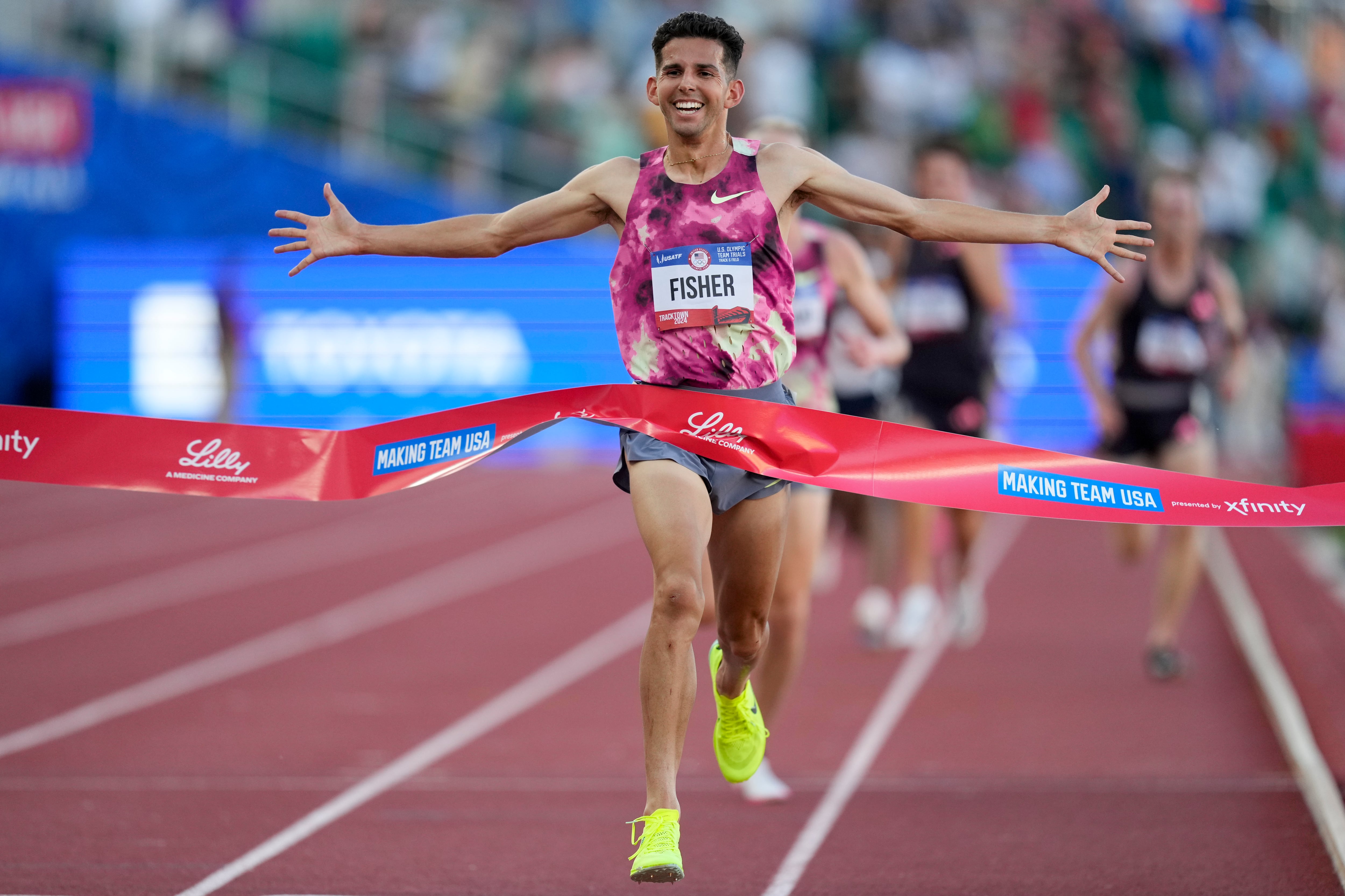 (Charlie Neibergall | AP) Grant Fisher wins the final in the men's 10000-meter run during the U.S. Track and Field Olympic Team Trials Friday, June 21, 2024, in Eugene, Ore.