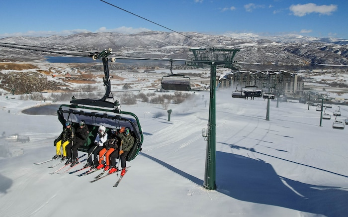 (Francisco Kjolseth  | The Salt Lake Tribune) Skiers ride Deer Valley Resort's new Keetley Express during its maiden voyage Tuesday, Dec. 31, 2024. The high-speed, six-person bubble lift is the first to operate out of the resort's new East Village base and gives skiers access to some of the more than 3,000 acres of new terrain Deer Valley plans to open in the coming years.