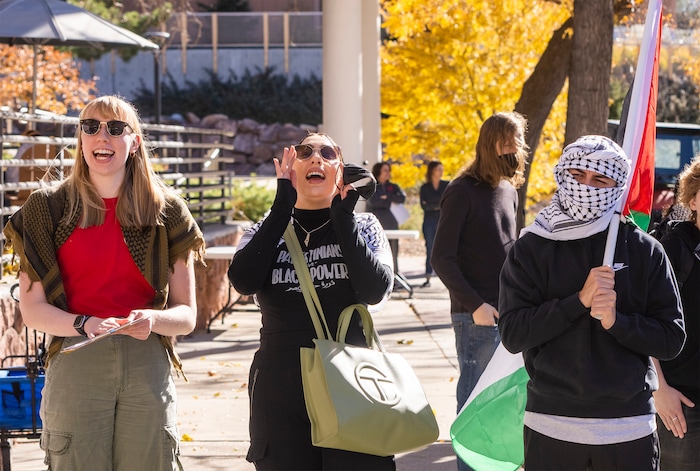 (Rick Egan | The Salt Lake Tribune)  Supporters of Mecha cheer along with the speakers, during a protest on the University of Utah Campus, on Wednesday, Nov. 15, 2023.
