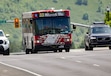 (Francisco Kjolseth  |  The Salt Lake Tribune) A UTA bus travels the streets of Salt Lake City in June 2024. Bus and rail service is poised to expand.