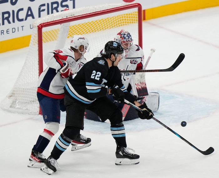 (Francisco Kjolseth  | The Salt Lake Tribune) Utah Hockey Club center Jack McBain (22) tries to get a shot past the Washington Capitols defense during an NHL hockey game at the Delta Center in Salt Lake City on Monday, Nov. 18, 2024.