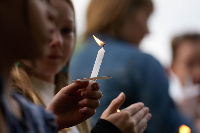 (Francisco Kjolseth  |  The Salt Lake Tribune) Uintah Elementary schoolmates gather for a candlelight memorial at Laird Park in Salt Lake City on Wednesday, May 22, 2024, to honor Adlai Owen. Police say Adlai’s father, Sam Owen, fatally shot Adlai before killing himself in an apparent murder-suicide on Saturday, May 18, 2024.