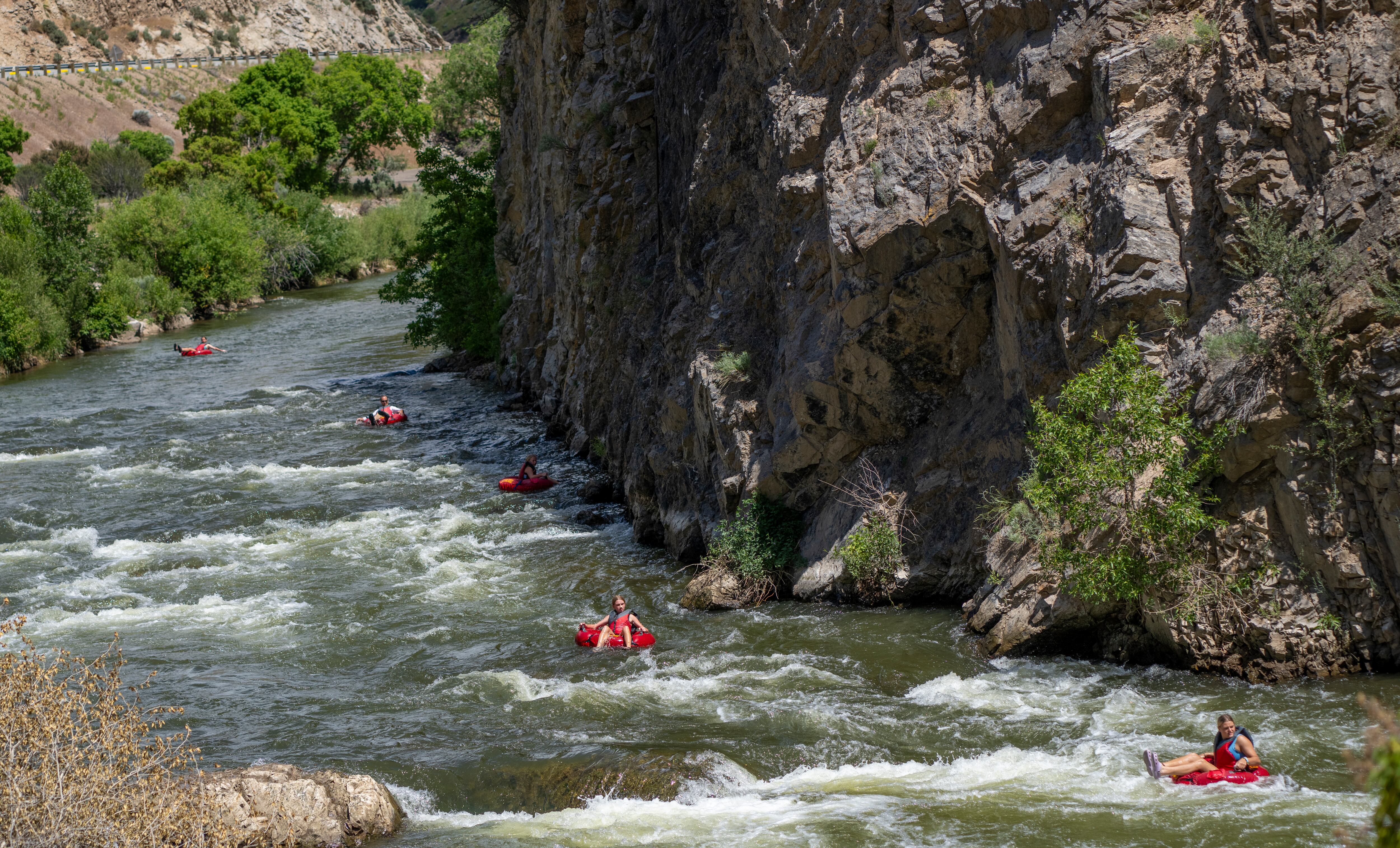 (Rick Egan | The Salt Lake Tribune) Rafters float the Hen-Tag section of the Weber River near the Taggart takeout point, on Friday, June 21, 2024.
