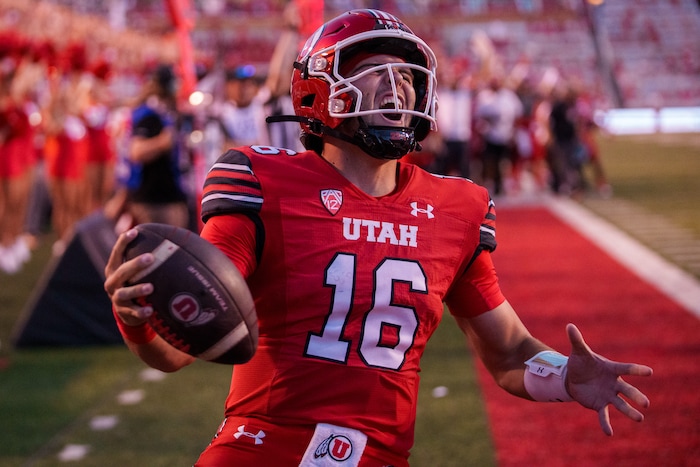 (Trent Nelson  |  The Salt Lake Tribune) Utah Utes quarterback Bryson Barnes (16) scores a touchdown as the Utah Utes host the Florida Gators, NCAA football in Salt Lake City on Thursday, Aug. 31, 2023.