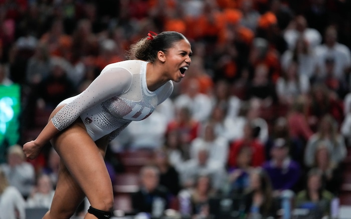 (Francisco Kjolseth  |  The Salt Lake Tribune) Jaedyn Rucker celebrates her floor routine during the Pac-12 Gymnastics Championships, at the Maverik Center in West Valley City on Saturday, March 23, 2024.