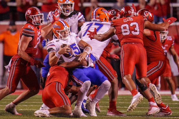 (Trent Nelson  |  The Salt Lake Tribune) Utah Utes defensive end Logan Fano (0) sacks Florida Gators quarterback Graham Mertz (15) as the Utah Utes host the Florida Gators, NCAA football in Salt Lake City on Thursday, Aug. 31, 2023.