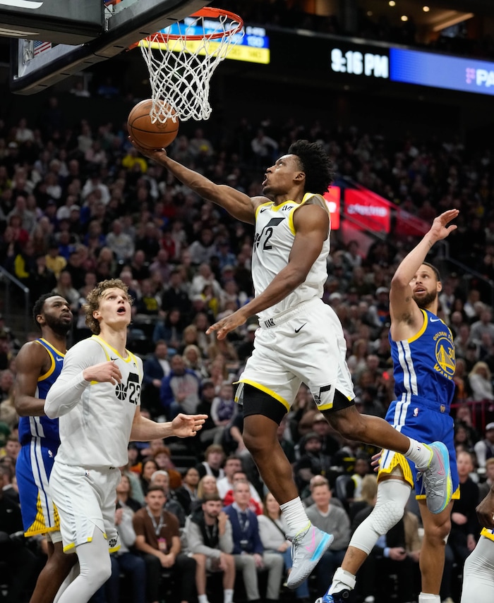 (Francisco Kjolseth  |  The Salt Lake Tribune) Utah Jazz guard Collin Sexton (2) sails in a shot past the Warriors during an NBA basketball game Thursday, Feb. 15, 2024, in Salt Lake City.