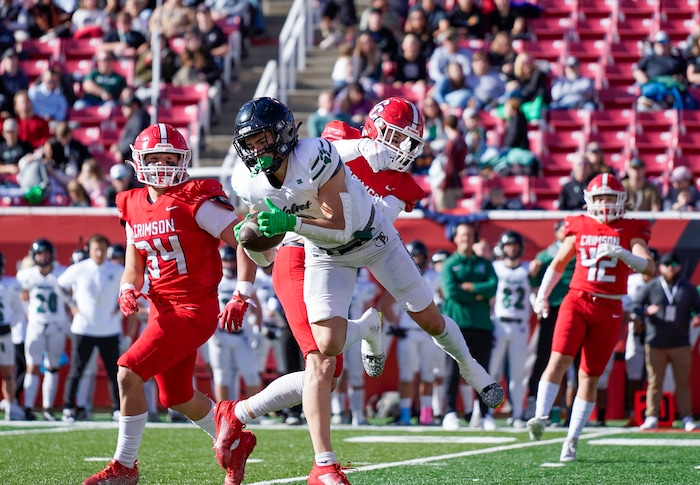 (Chris Samuels | The Salt Lake Tribune) Green Canyon wide receiver Bryson Pabst, center, brings down a catch during the 4A high school football championship game against Crimson Cliffs at Rice-Eccles Stadium, Friday, Nov. 17, 2023.