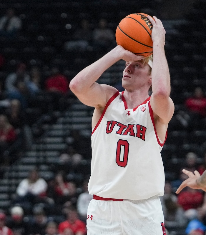 (Bethany Baker  |  The Salt Lake Tribune) Utah Utes guard Hunter Erickson (0) shoots against the Hawaii Warriors at the Delta Center in Salt Lake City on Thursday, Nov. 30, 2023.