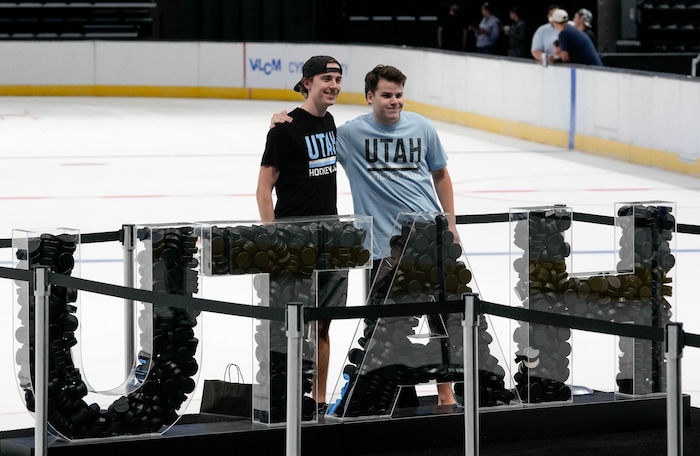 (Francisco Kjolseth  |  The Salt Lake Tribune) Caleb Funk, left, and Matthew Smith, pose for a photograph on the ice as the Utah Hockey Club hosts their first NHL draft party at the Delta Center on Friday, June 28, 2024.