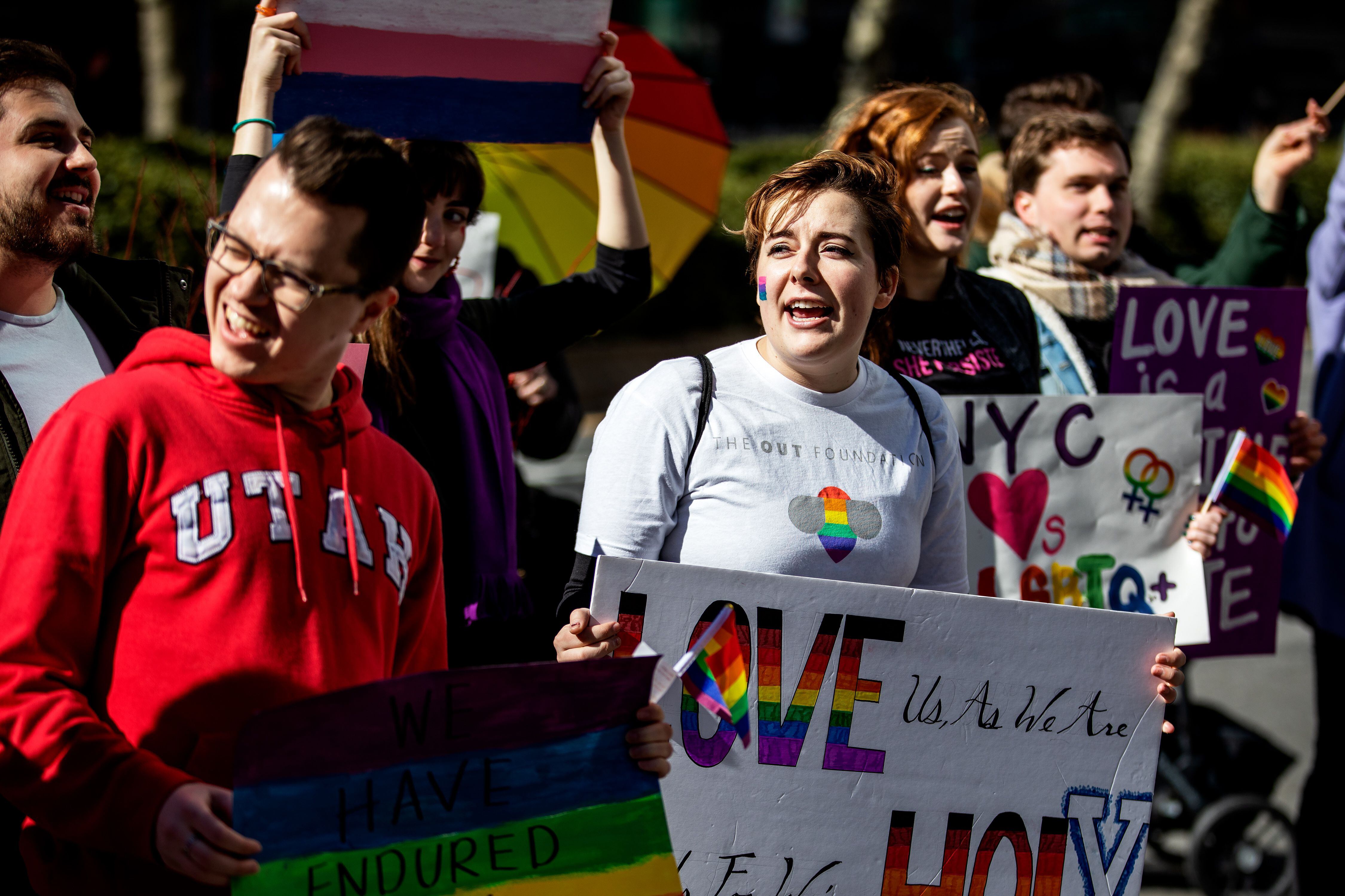 (Demetrius Freeman | for The Salt Lake Tribune) Current and former members of the Church of Jesus Christ of Latter-day Saints, the LGBTQ+ community, and supporters gather at Lincoln square across from the Mormon temple in Manhattan, New York, on March 7, 2020, to stand in solidarity with LGBTQ+ students who attending Brigham Young University. Brigham Young University reinstated homophobic policies in their student handbook that prohibit Òhomosexual behavior.Ó