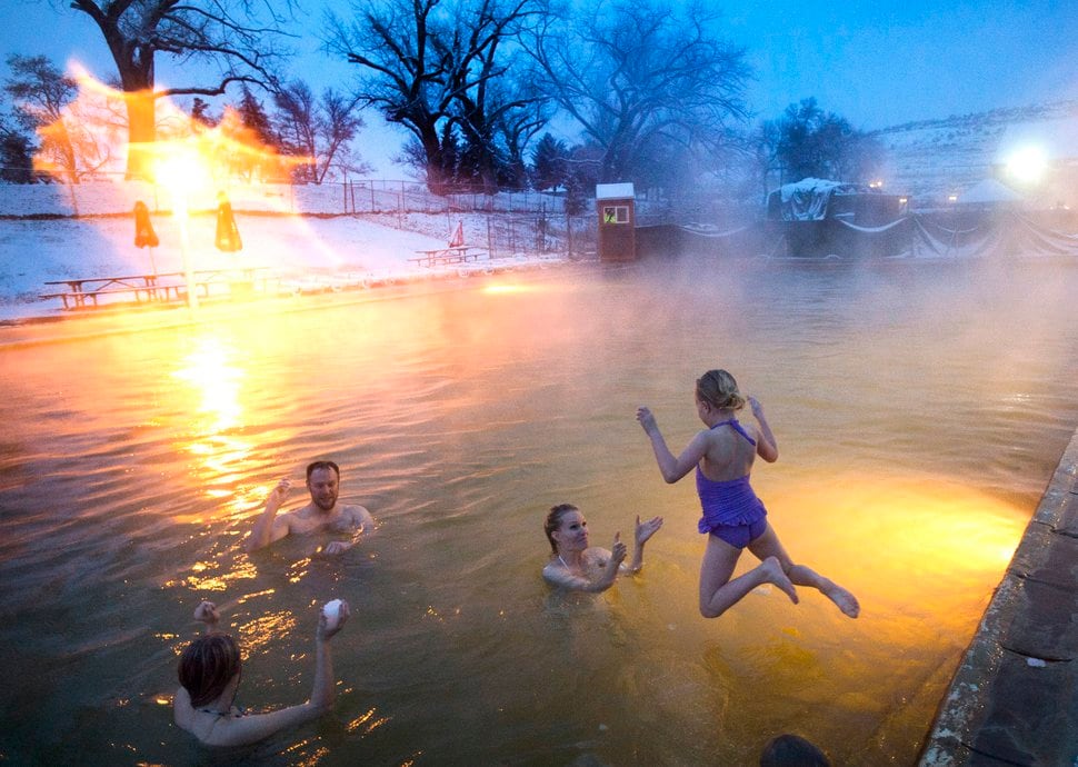 (Rick Egan | Tribune file photo) A family enjoys a soak at Crystal Hot Springs in Honeyville on Dec. 14, 2016.