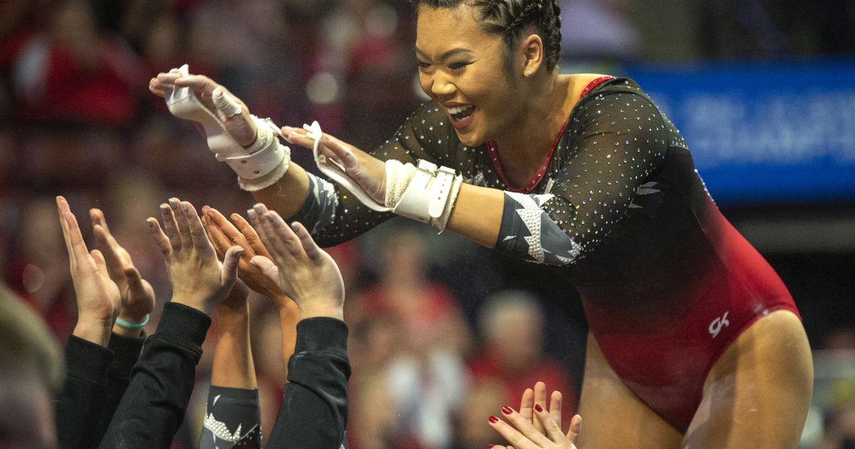 Red All Over: Ute gymnast Kari Lee and football player Chase Hansen ...