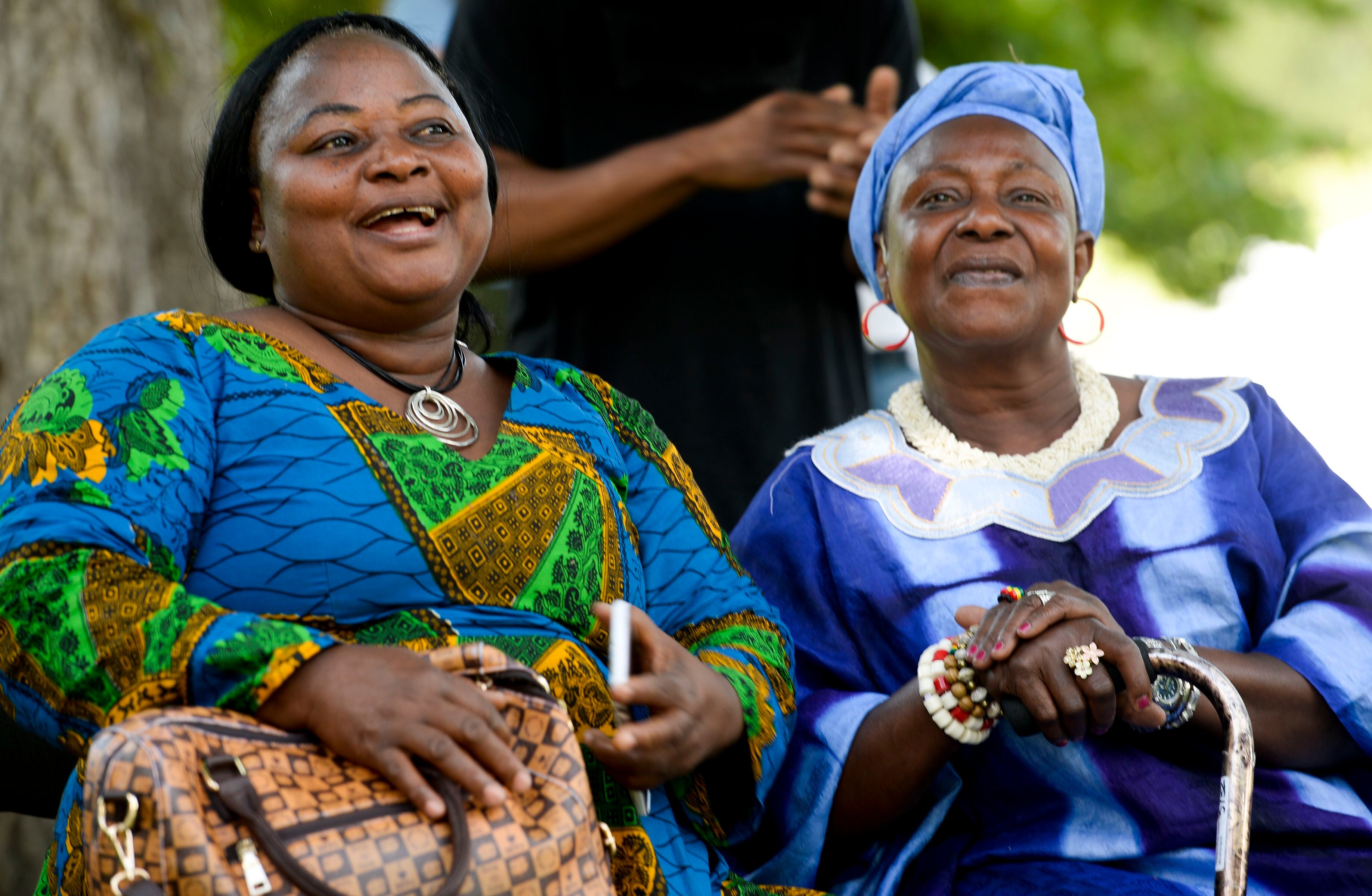 (Leah Hogsten | The Salt Lake Tribune) l-r Florance Garley and her sister Biendu Kamara cheer for GarleyÕs twin daughters as they dance during the 4th Annual African Festival sponsored by the United Africans of Utah, Saturday, July 27, 2019 at Liberty Park. The African Festival promotes African tradition, culture and heritage through the arts, food fashion, music and dance.