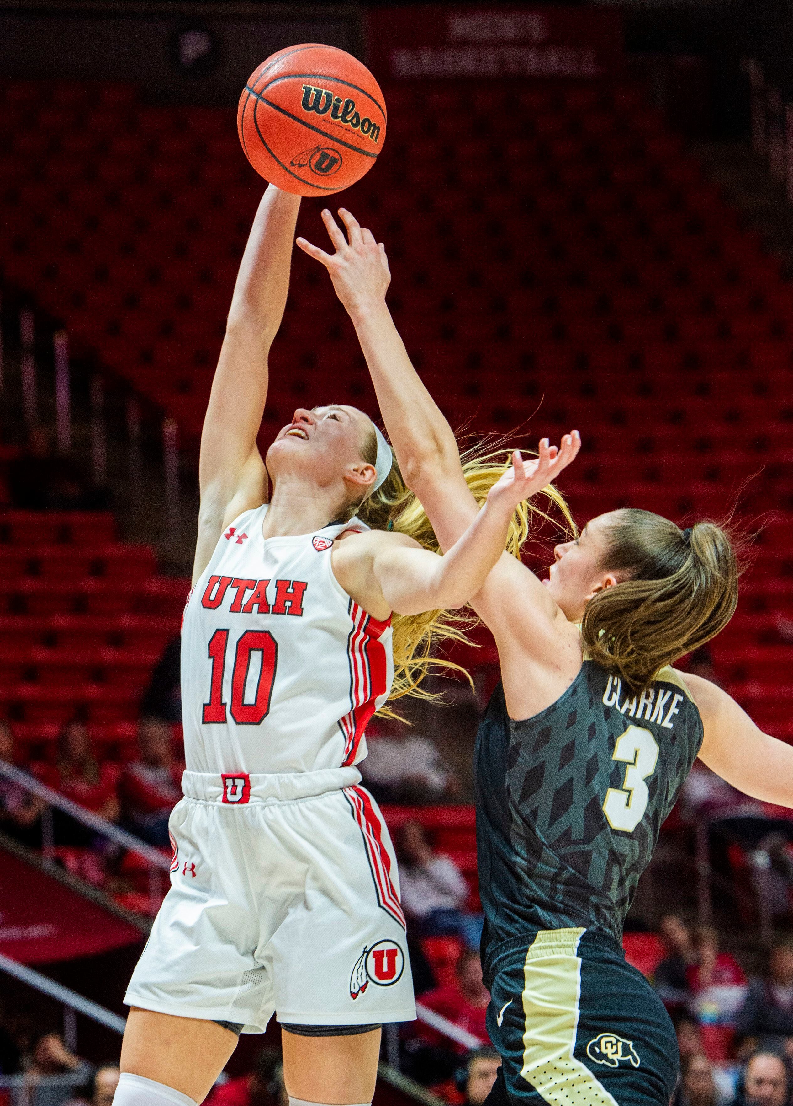 (Rick Egan | The Salt Lake Tribune) Colorado Buffaloes guard Emma Clarke (3) gets her hand on a shot by Utah guard Dru Gylten (10), in PAC-12 basketball action between the Utah Utes and the Colorado Buffaloes, at the Jon M. Huntsman Center, Sunday, Nov. 29, 2019.