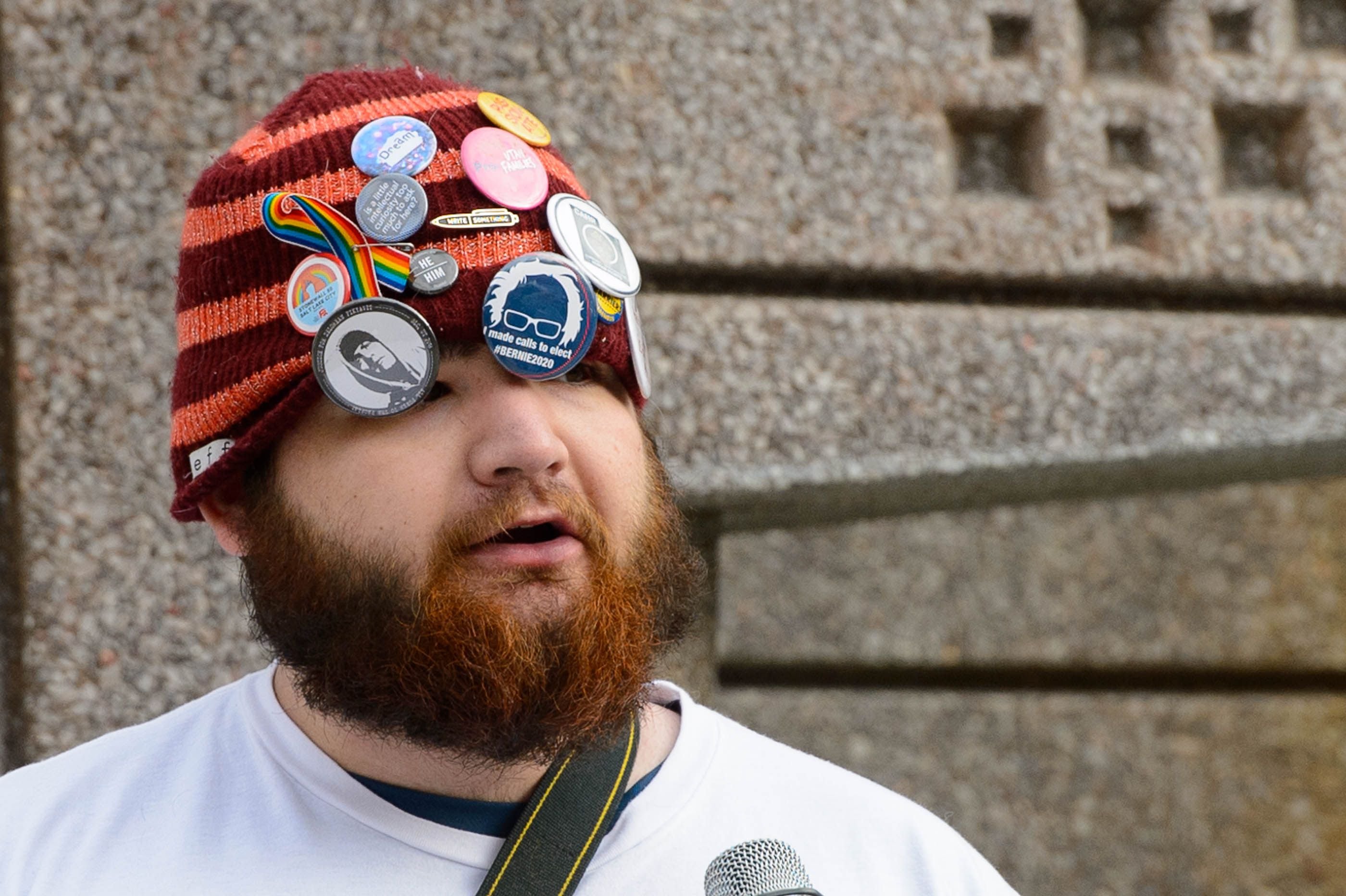 (Trent Nelson | The Salt Lake Tribune) Phelan Acheson speaks as people gather in front of the Federal Building in Salt Lake City on Saturday, Jan. 4, 2020 to protest the escalation of tensions with Iran.