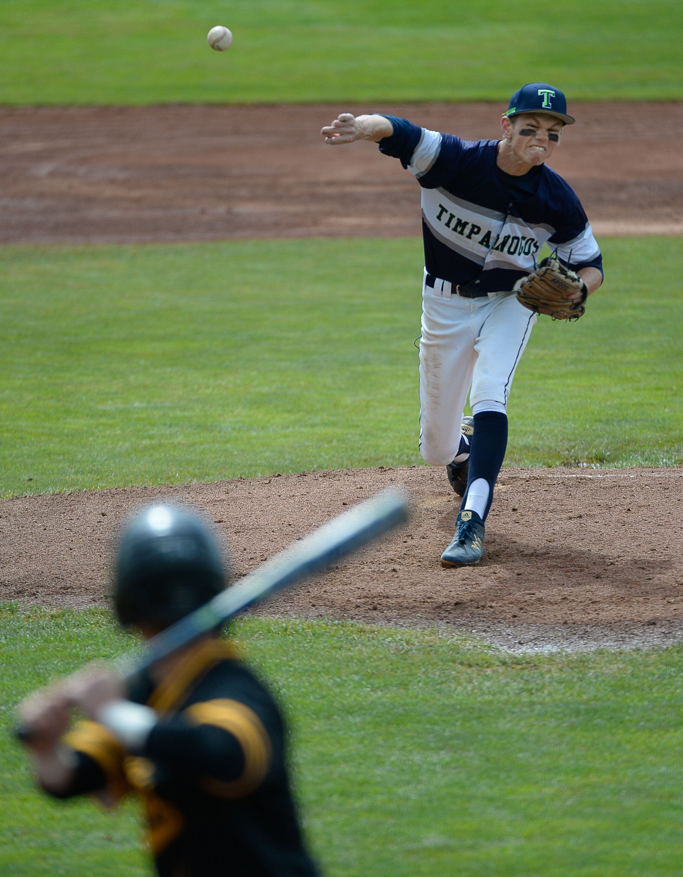 (Francisco Kjolseth | The Salt Lake Tribune) Carter Wilde pithes the first round against Cottonwood during the 5A baseball championship game at UCCU Stadium on the UVU campus in Orem, Friday, May 24, 2019.