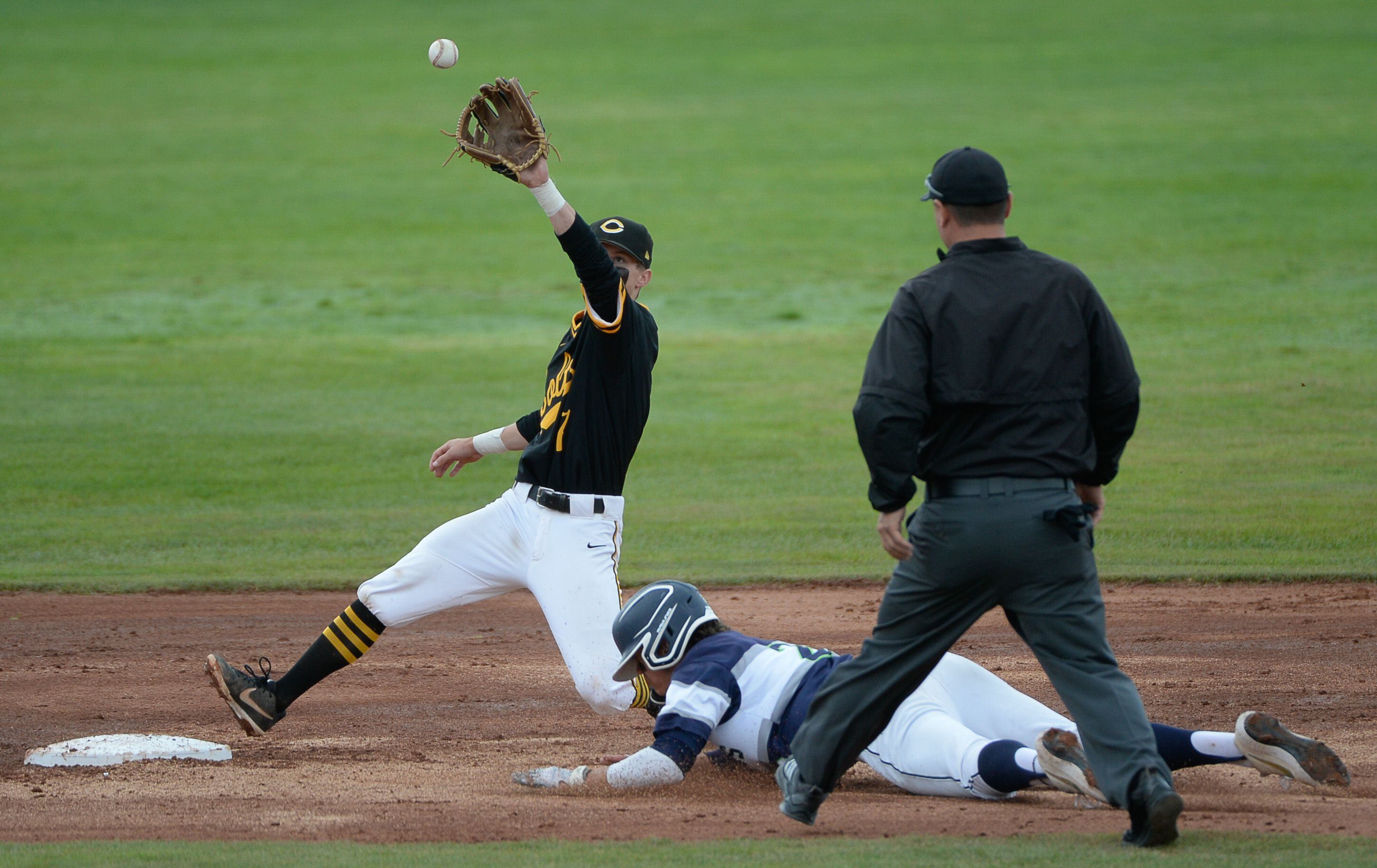 (Francisco Kjolseth | The Salt Lake Tribune) Tyson Heinz of Timpanogos safely steals second base ahead of Cade Perkins of Cottonwood during the 5A baseball championship game at UCCU Stadium on the UVU campus in Orem, Friday, May 24, 2019.